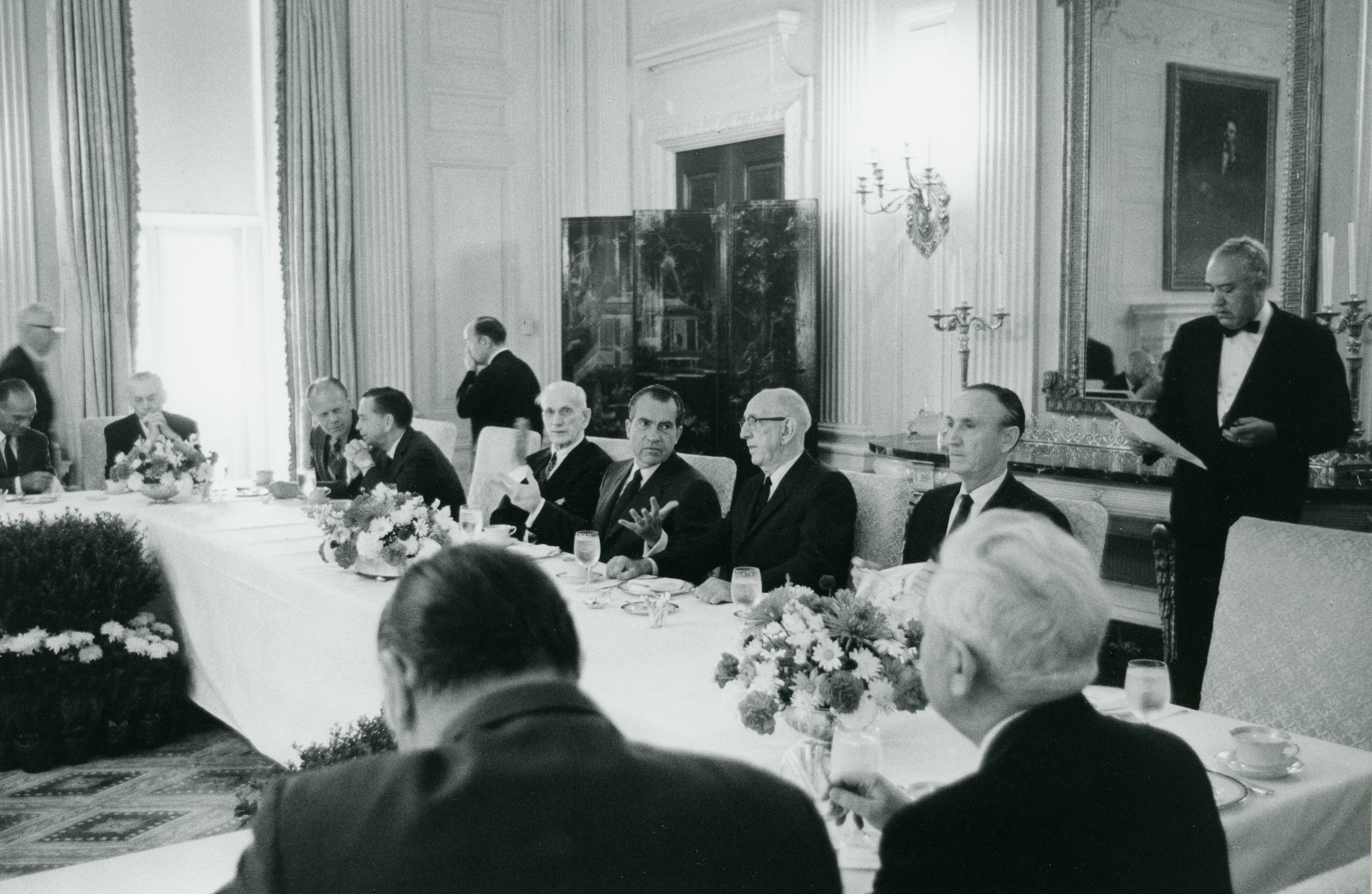 1a. President Nixon seated at the dining table during a bipartisan leadership breakfast 7-22-69 (1590-05) (2)